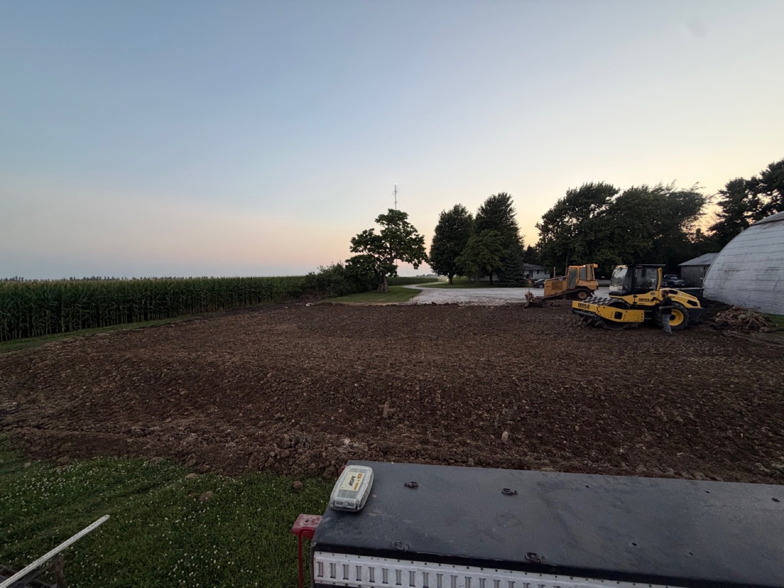Wide view of a completed clay building pad in Harcourt Iowa